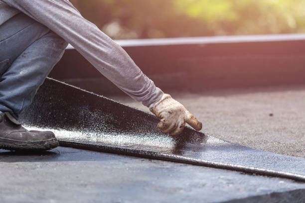 Professional Basement Waterproofing technician working in Hamburg, PA